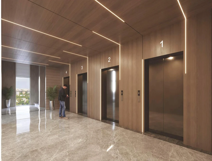 Luxury commercial passenger lift lobby and high speed elevator layout with granite jambs at Emerald world park office building